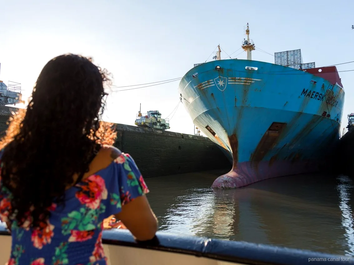 Cargo ship sharing the Panama Canal transit with the tour vessel